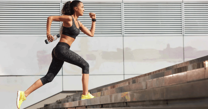 Person walking briskly outdoors for exercise